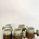 5 glazed and scarified ceramic cups