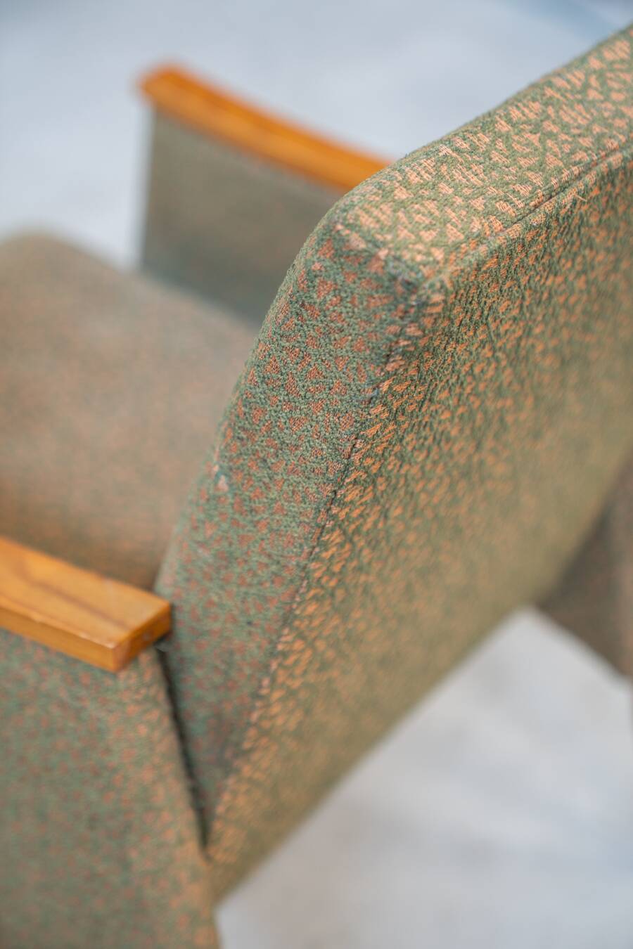 Pair of vintage armchairs in oak and embossed fabric, with old republished certificate of authenticity