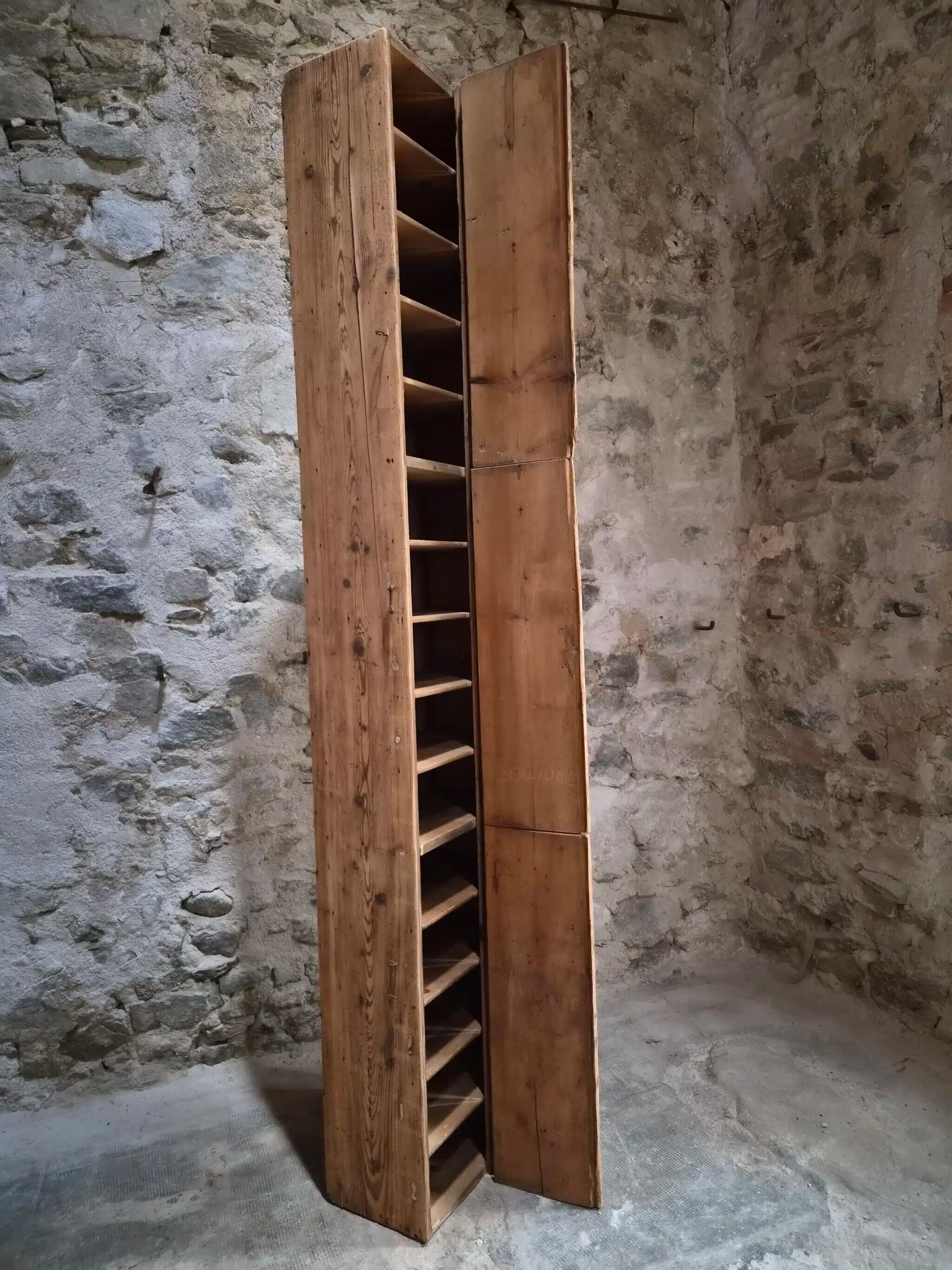 Antique French workshop cabinet in pine with compartments.