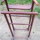 Chamber valet in mahogany tinted beech from the 70s with castors