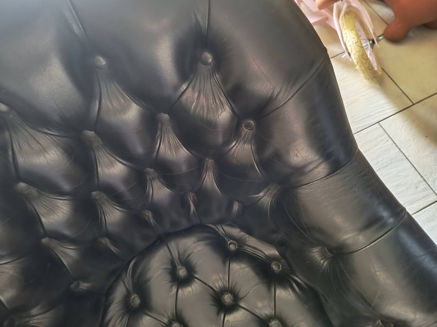 Two Chesterfield armchairs