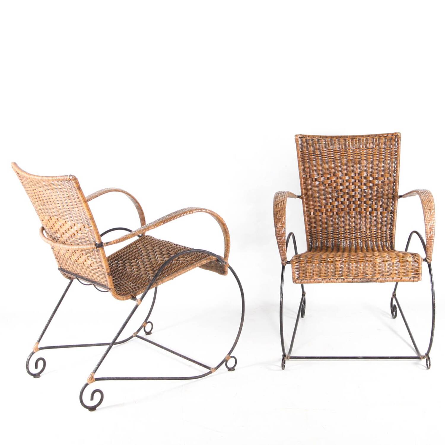 Pair of rattan and iron armchairs