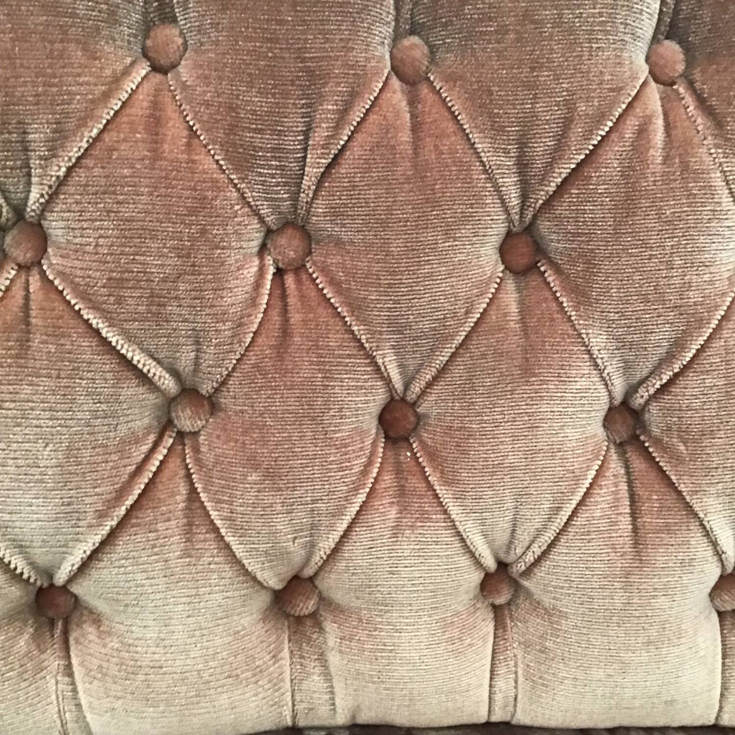 Pale pink tufted back toad sofa