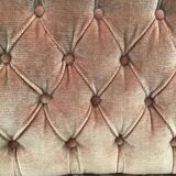 Pale pink tufted back toad sofa