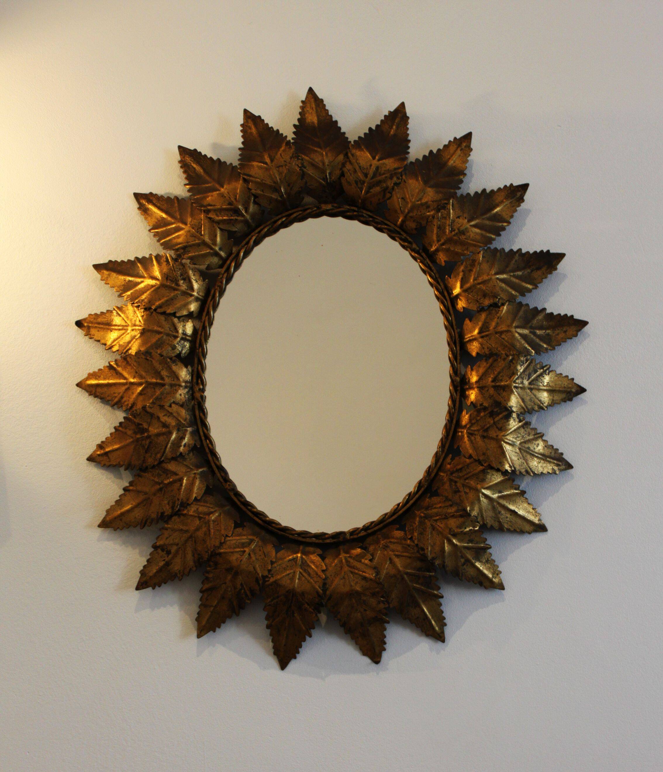 Oval sun mirror, 61x52cm.