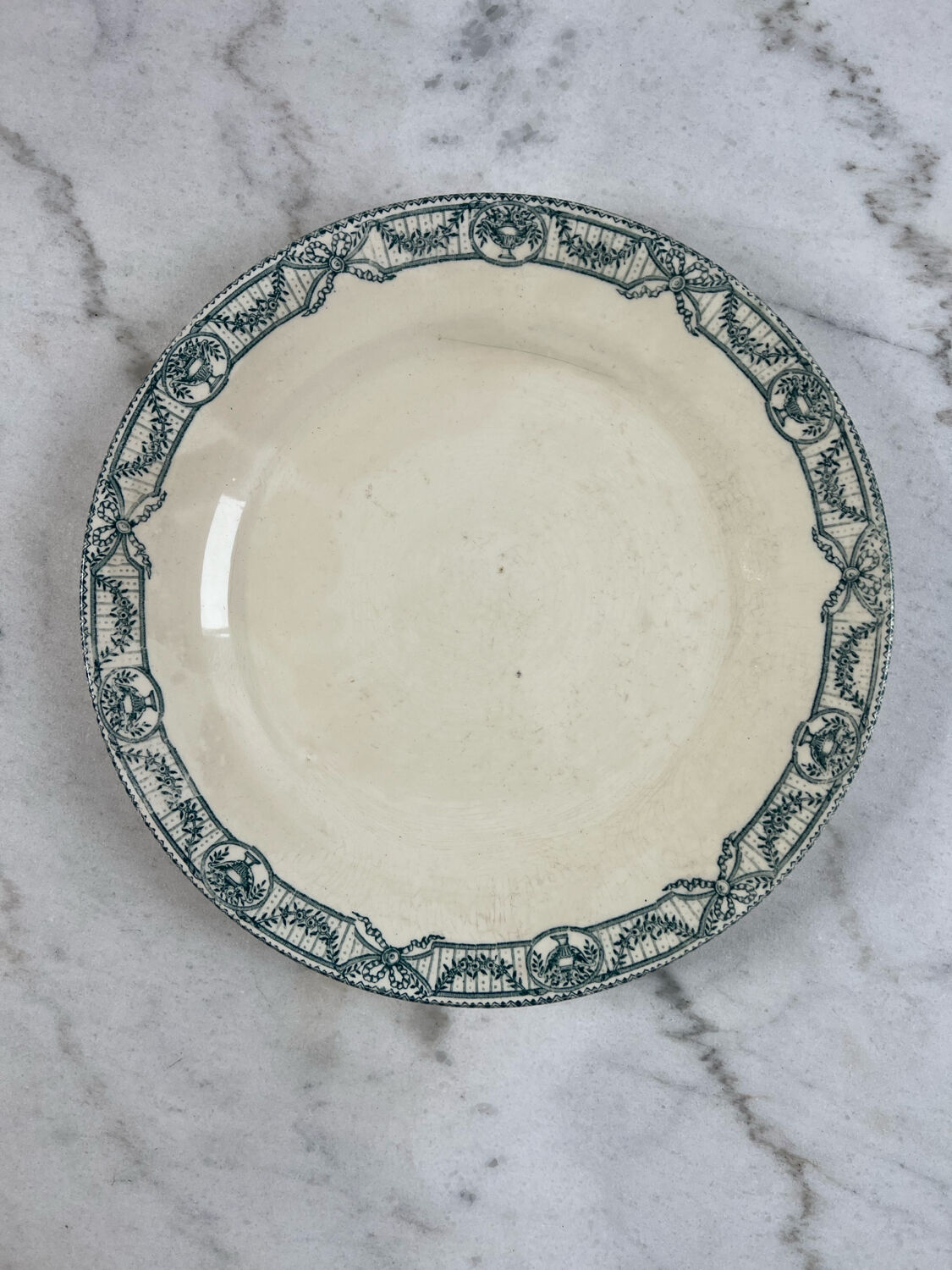 Large ironstone plate, Directoire, Salins.