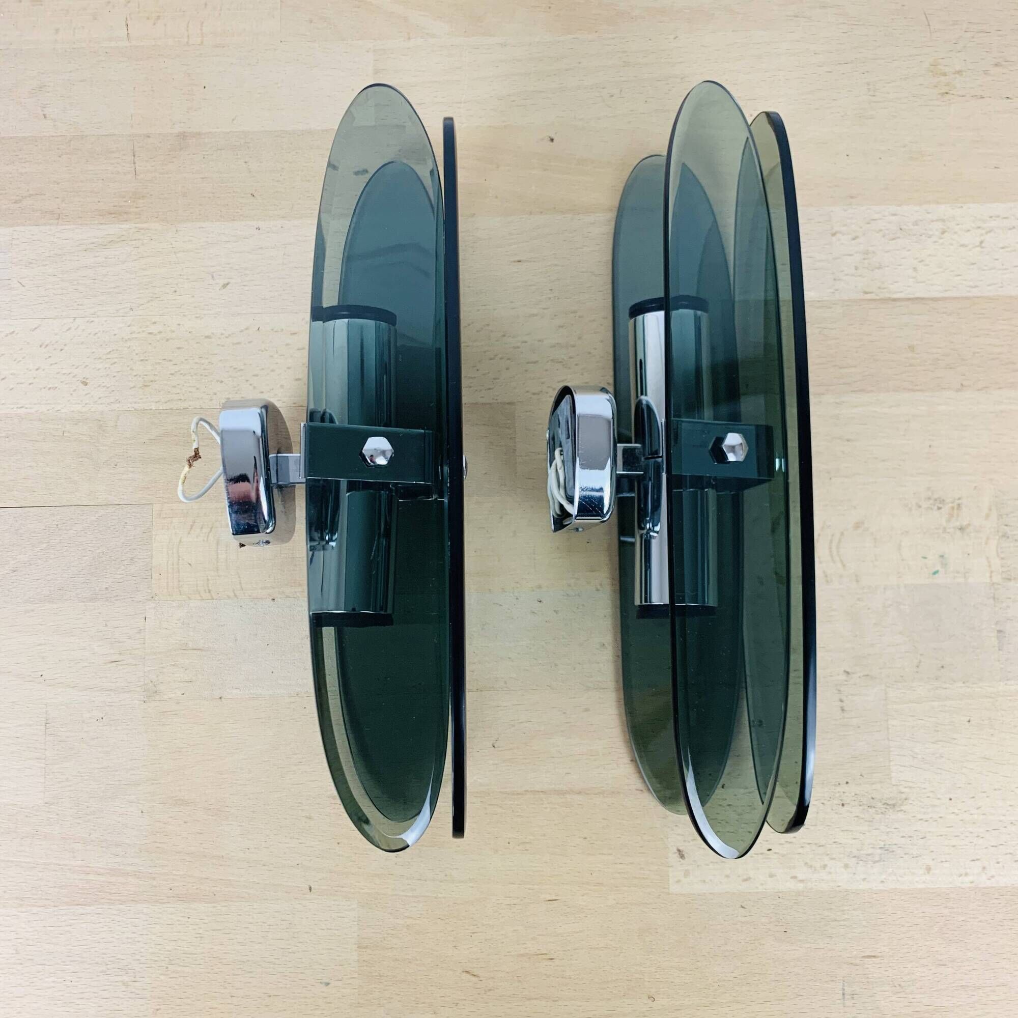 Pair of 70s smoked glass chrome wall lights