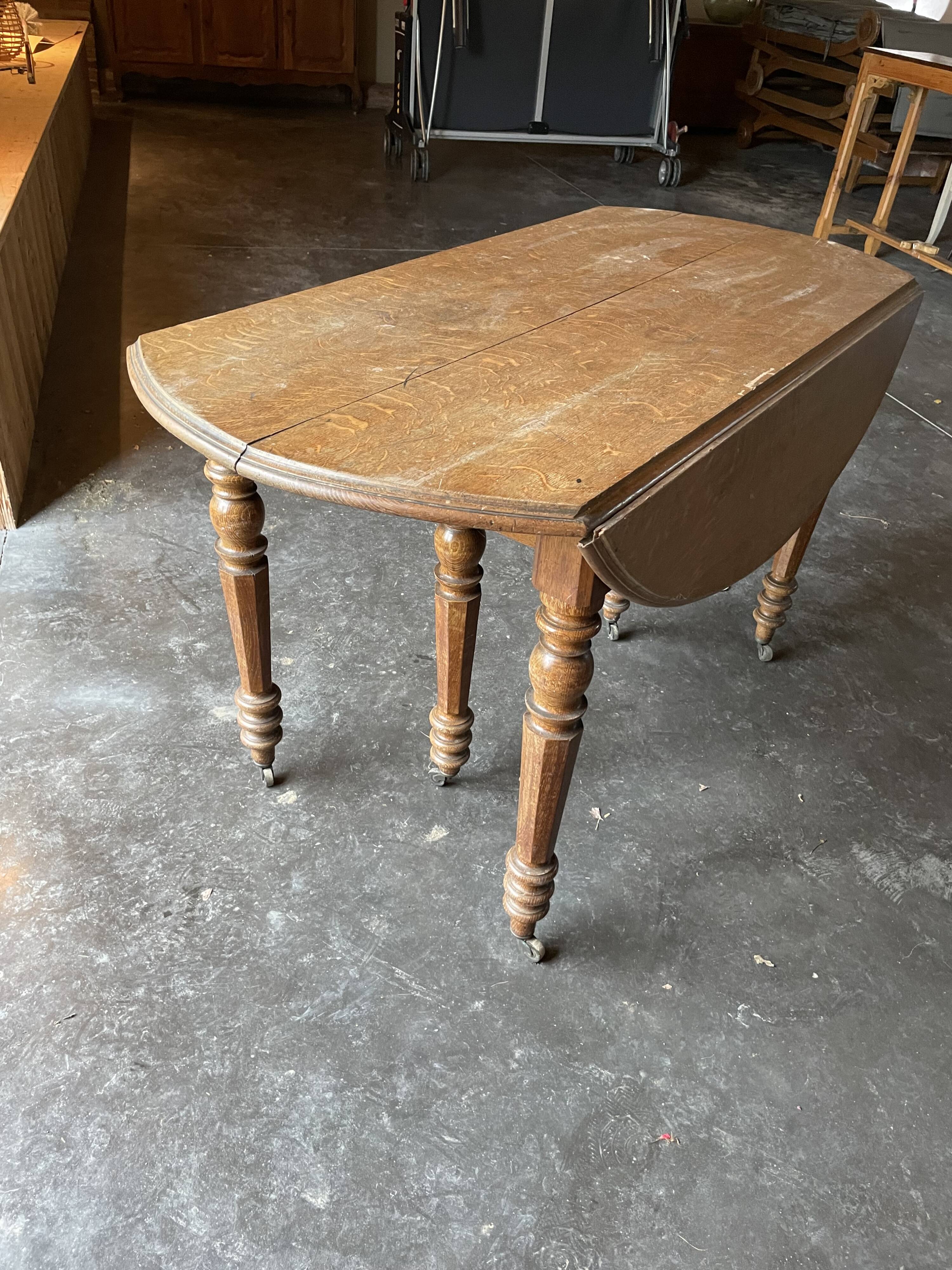 Old wooden table with folding flaps