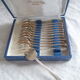 12 fourchettes a huitres en met. argente