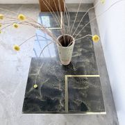 "Rizzo" lacquered and brass coffee-bar table from the 1970s.