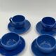 Set of 4 vintage blue ceramic cups and saucers.