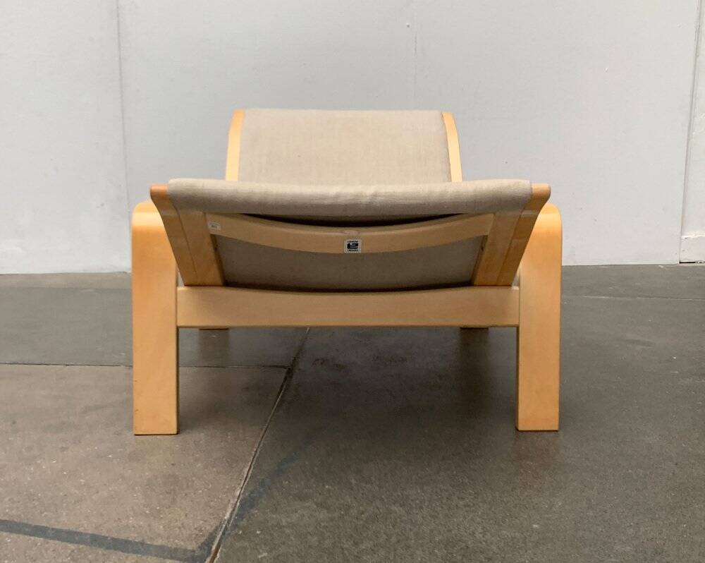 Pulkka lounge chair set in mid-century style with ottoman by Ilmari Lappalainen for Asko, Finland, 1960s.