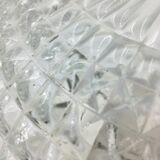 Ceiling lamp in molded glass in relief