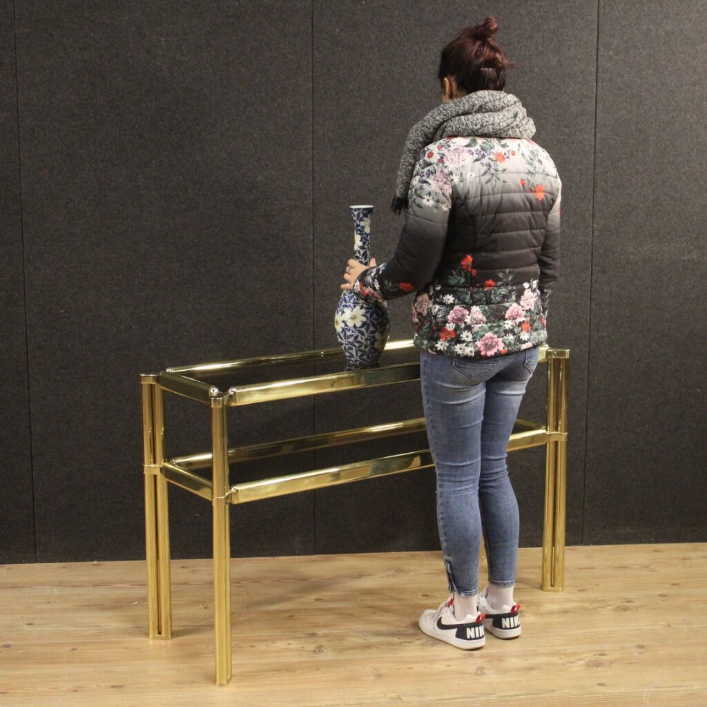 Italian console in gold metal