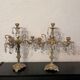 Duo of bronze chandeliers with tassels