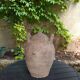 Ancient sandstone jar with two handles