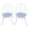 Pair of old white iron armchairs