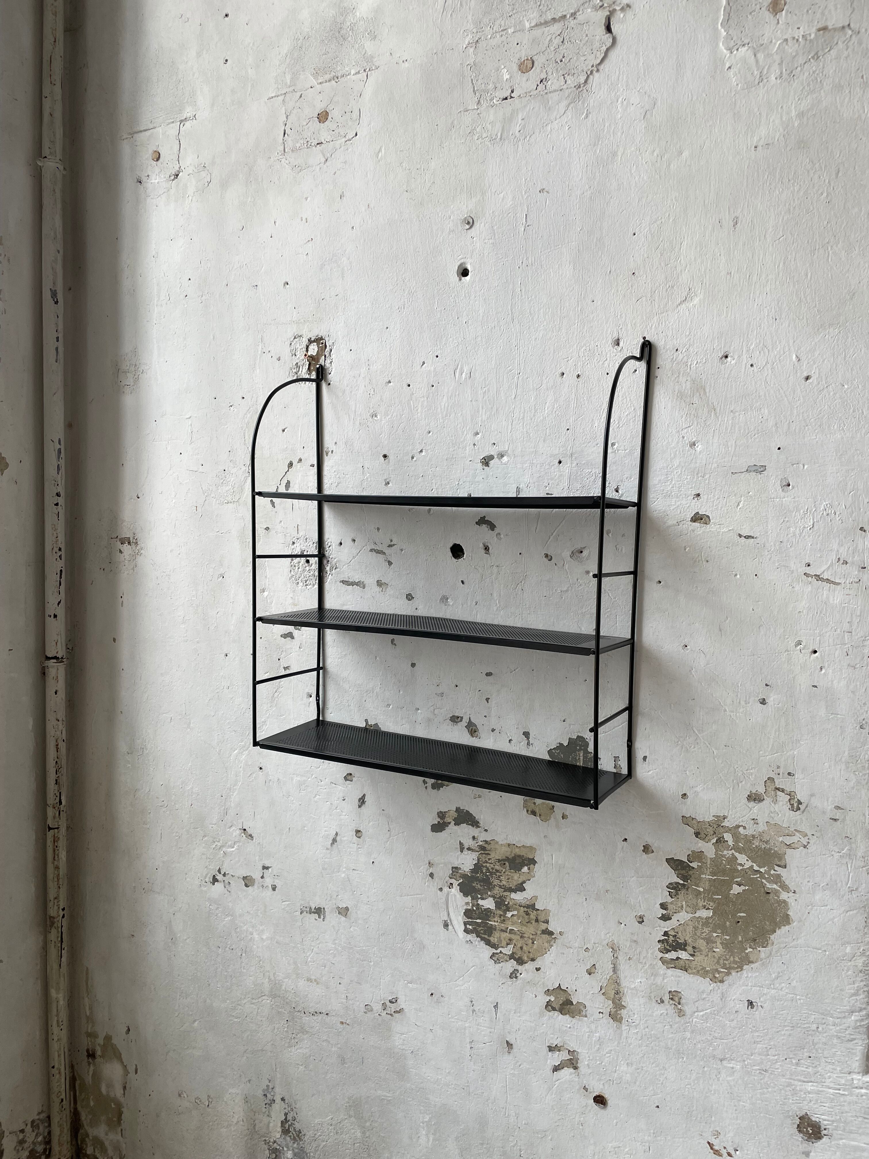 Black metal string shelf