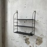 Black metal string shelf