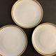 8 flat porcelain plates from Limoges Bernardaud, gilded Greek decoration, twentieth century