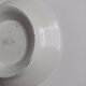 Old round footed plate signed Labrut brothers flowers
