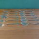 Box of 12 dessert forks in silver metal
