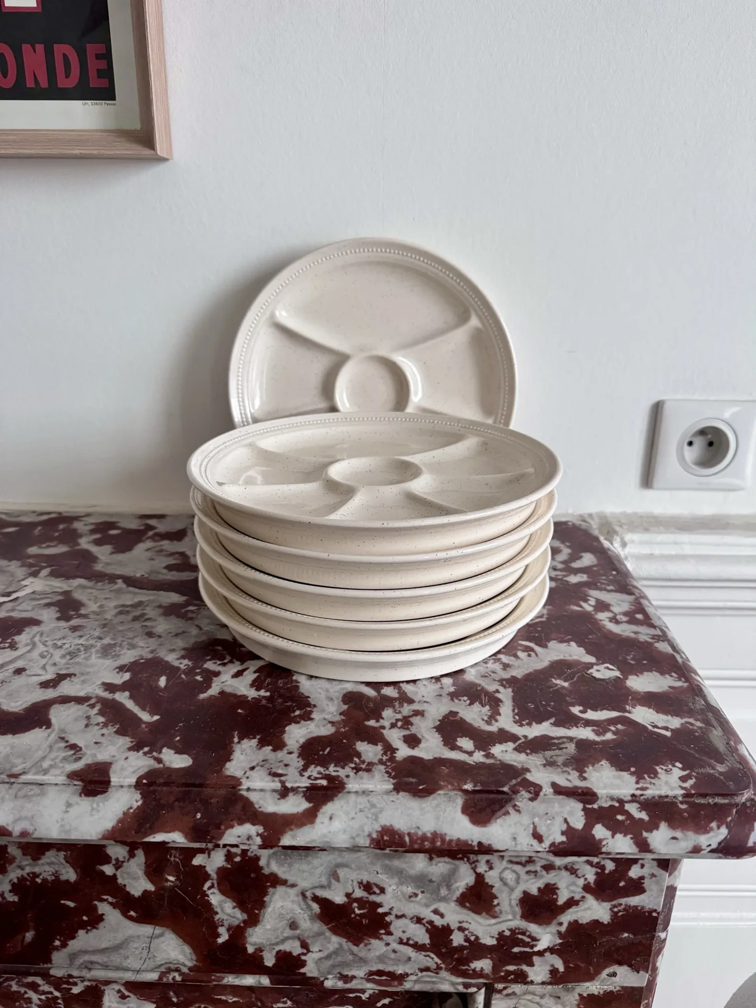 The earthenware fondue plates from Haute-Provence.
