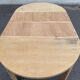 Table à manger scandinave ronde extensible décapée en chêne brut 1980