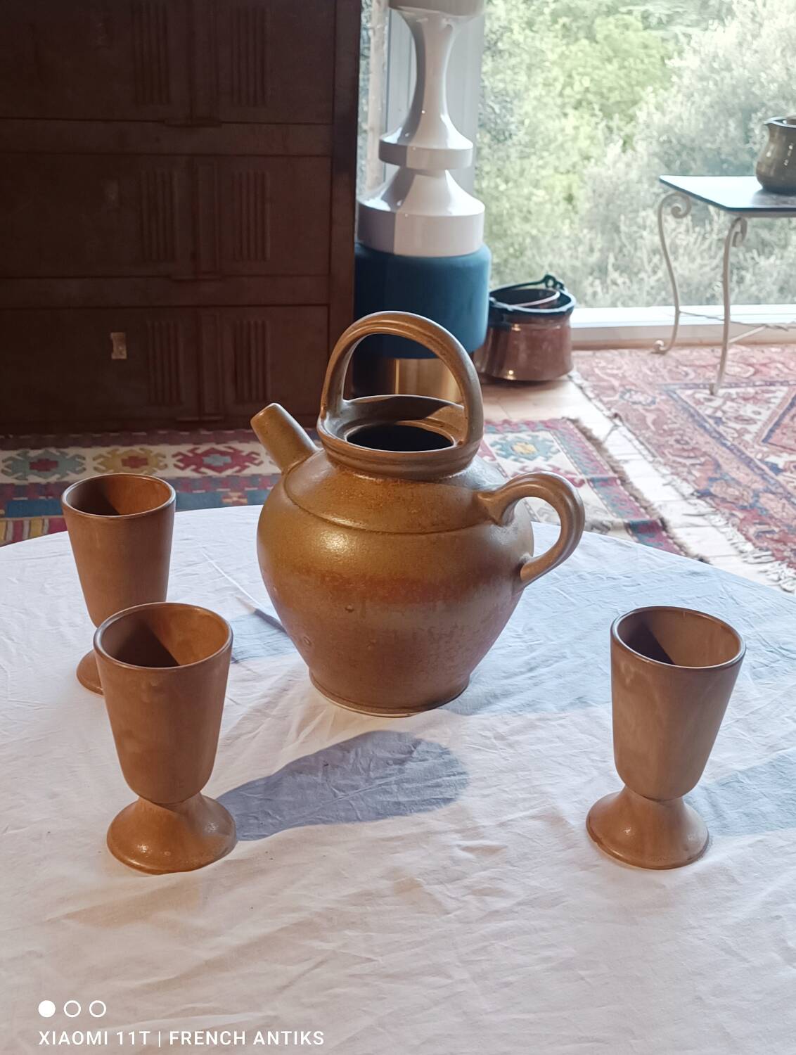 Iridescent carafe and 3 stoneware mazagrans from Digouin. Handmade work.