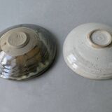 2 enameled stoneware cups, one of which is signed