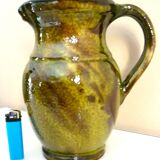 Pitcher vase, thick green glazed terracotta, signature to be identified