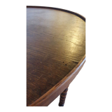 Round wooden table with beaded legs