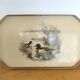 Vintage service tray with a golden gallery and mirror, decorated with ducks.