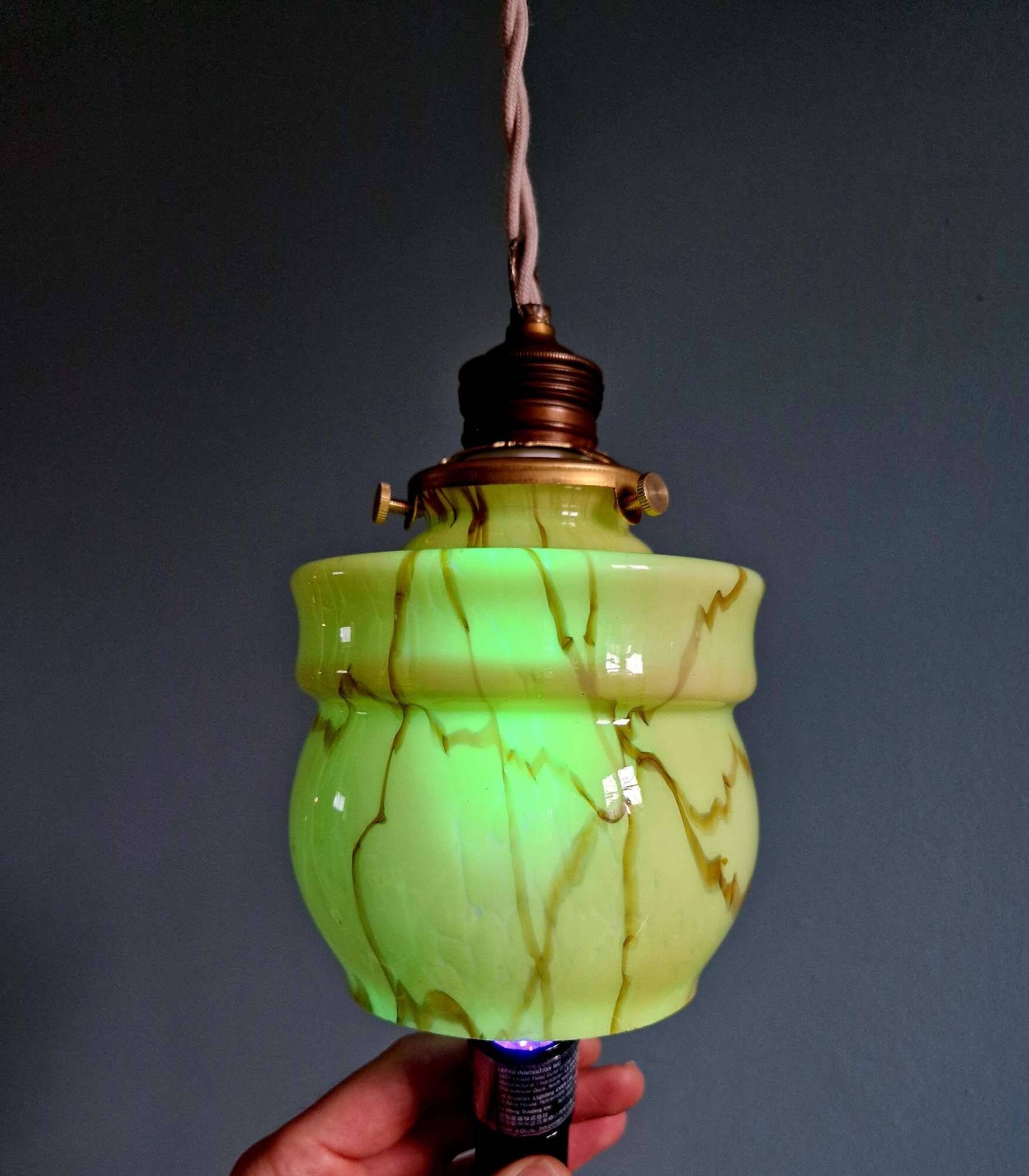 Art Deco trio of suspensions in opaline and marbled ouraline, Scailmont, 1920-30.