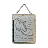 Old illustration "Exterior of a shoe" inserted under mirror