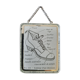 Old illustration "Exterior of a shoe" inserted under mirror