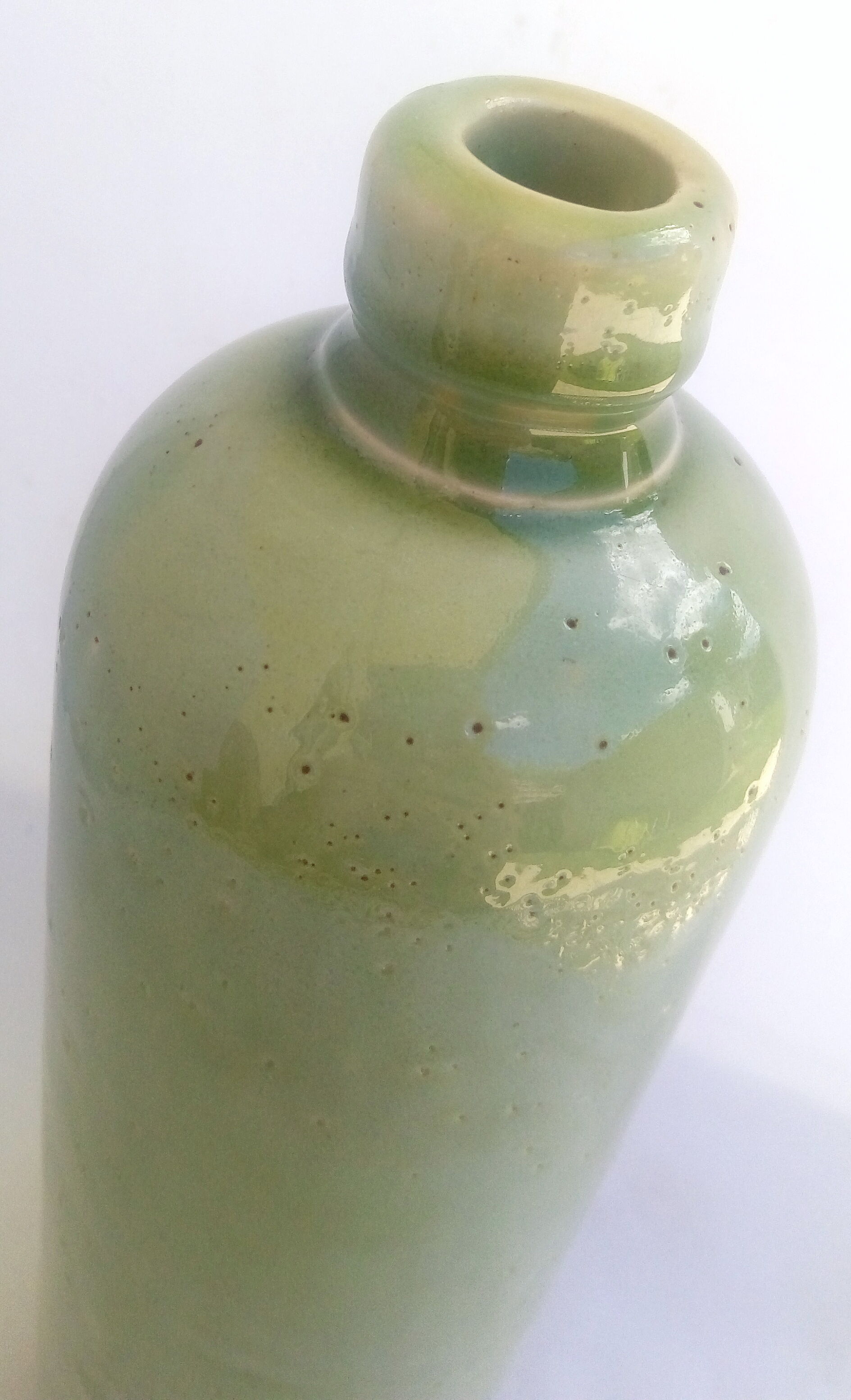 Apple green enamelled sandstone bottle