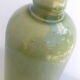 Apple green enamelled sandstone bottle