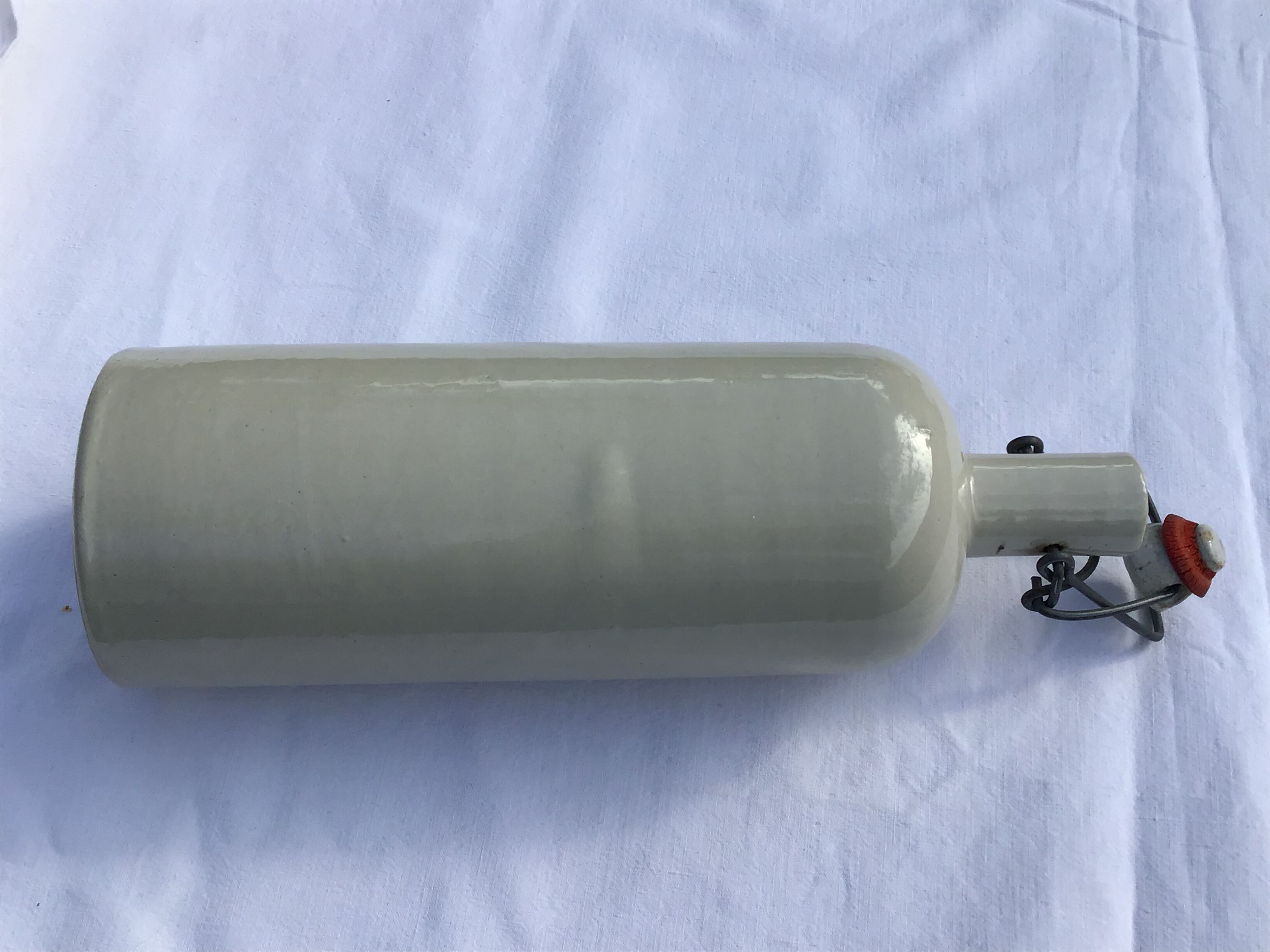 Old airtight white sandstone bottle