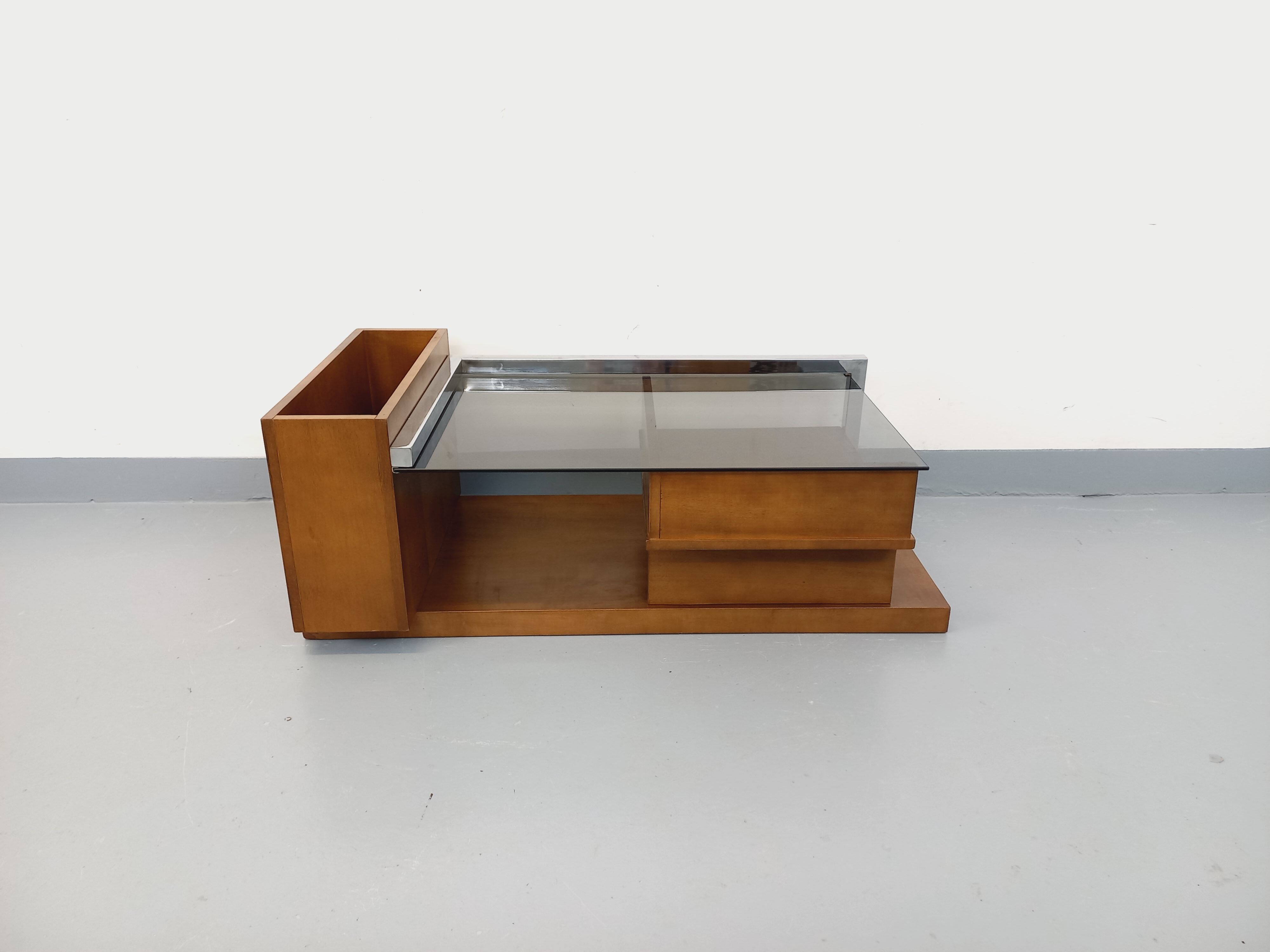 Rectangular vintage modernist coffee table with wooden niches, chrome.
