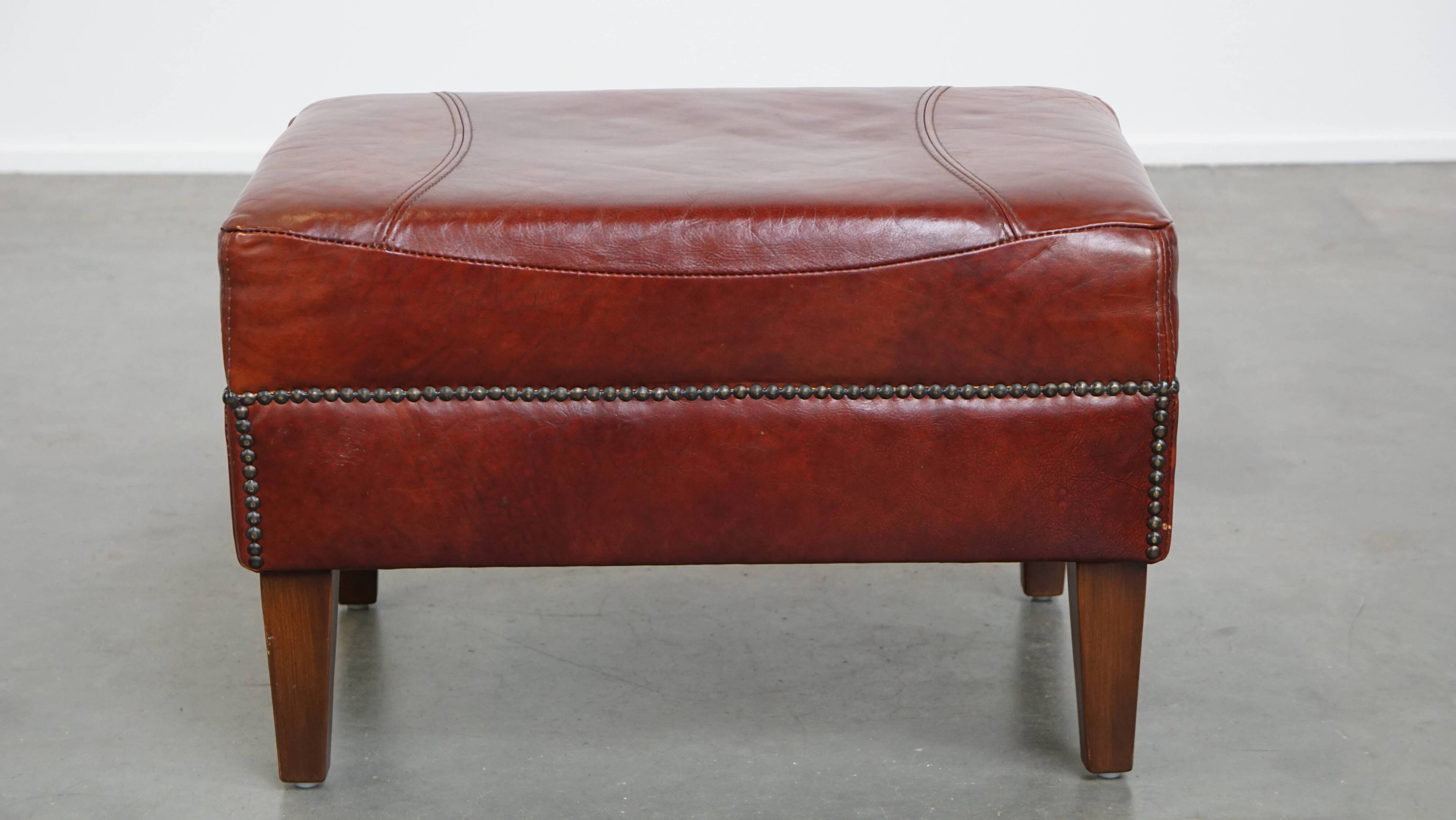 Ottoman couleur cognac en cuir de vachette