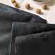 Set of four old damasked towels tinted black