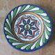 Decorative wall plate signed A. Alvarez