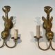 Pair of bronze wall sconces with dolphins by Maison Jansen