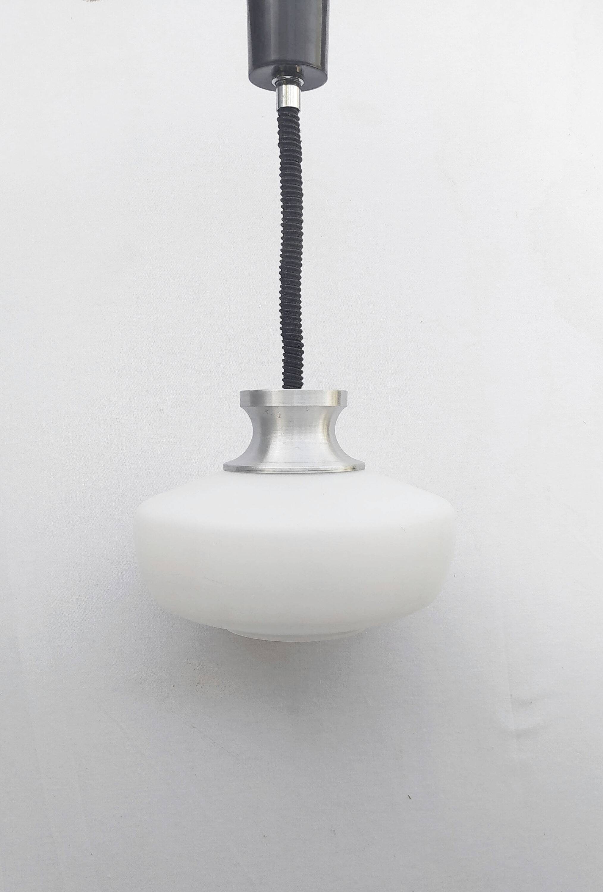 Space Age Saucer Globe Pendant Rises and Falls