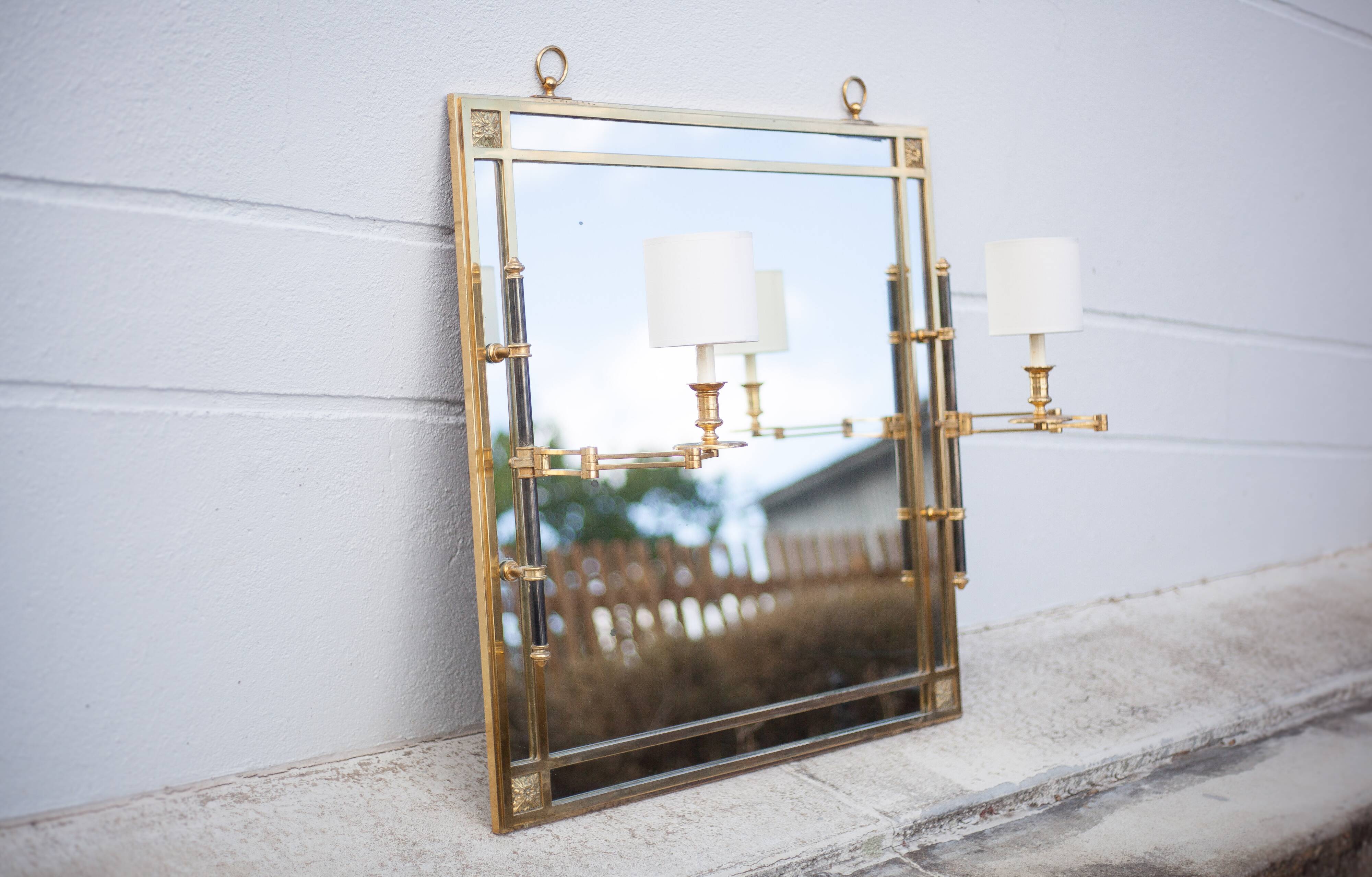 mirror with articulated wall light