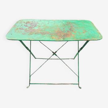 Ancienne table de jardin pliante en fer