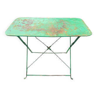 Old folding iron garden table