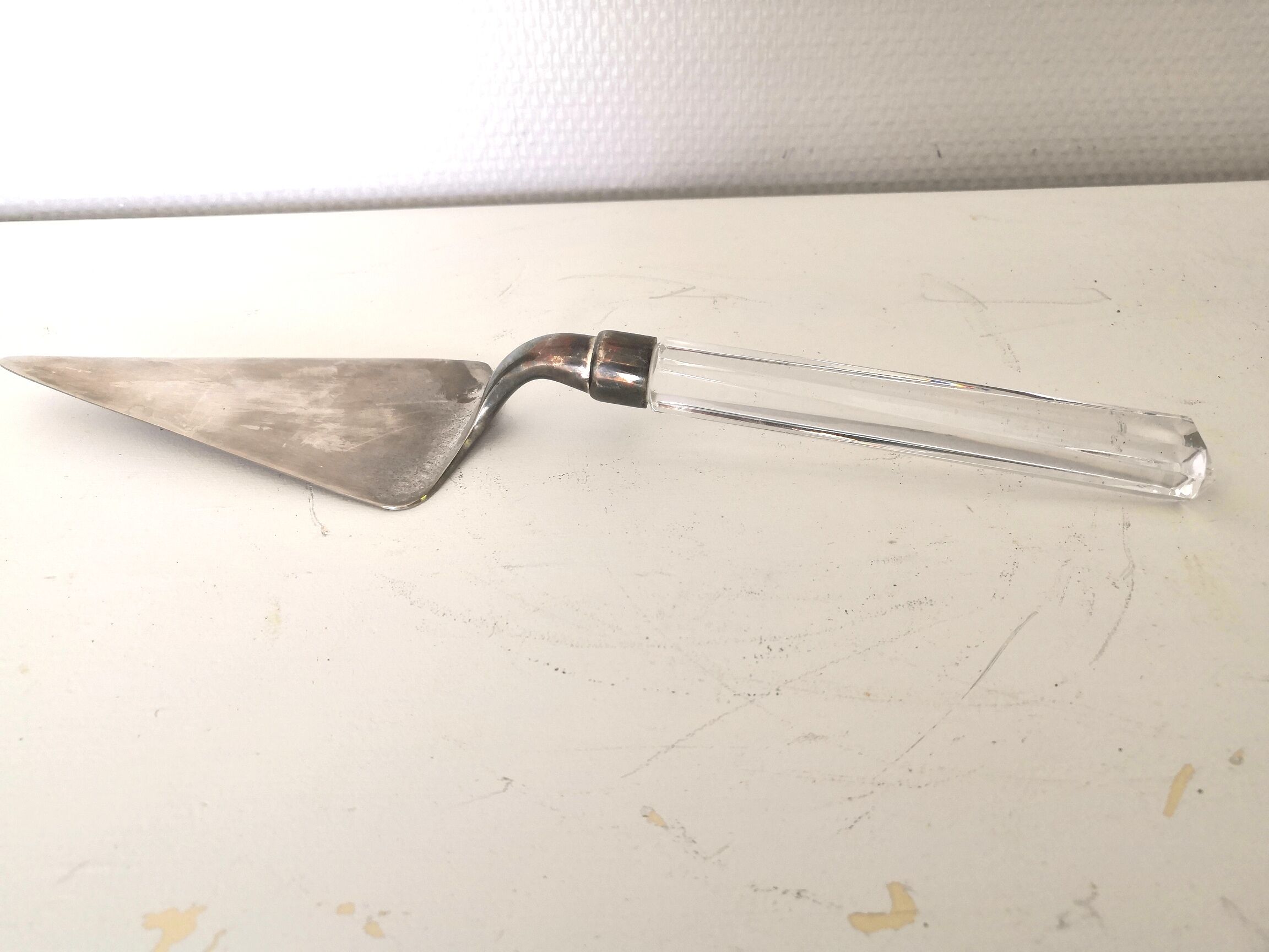 Silver metal pie shovel glass handle Lisa Mori