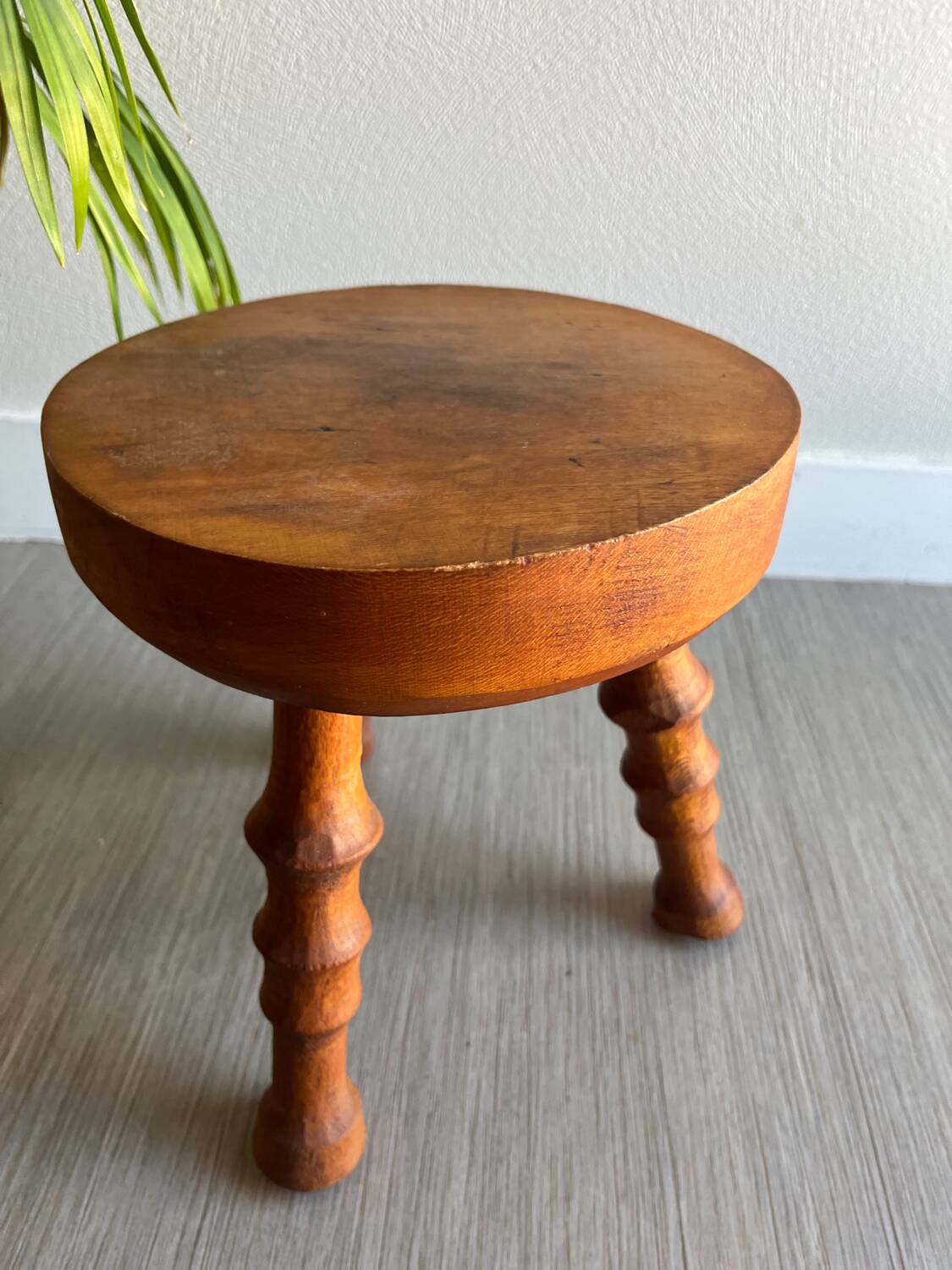 Wooden tripod stool